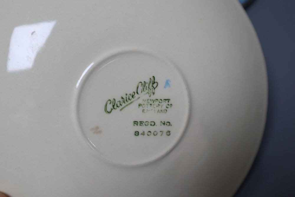 A Clarice Cliff Ravel pattern tea cup and saucer and a Queen Elizabeth II coronation trio, 1953